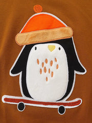 Toddler sweatshirt with brown cotton, featuring a cute penguin appliqué wearing an orange beanie and riding a skateboard.