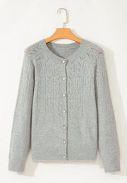 Gray lace-effect knit button-down cardigan with pearl buttons and a crew neck.