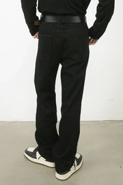Zipped hem black denim trousers with a relaxed fit.
