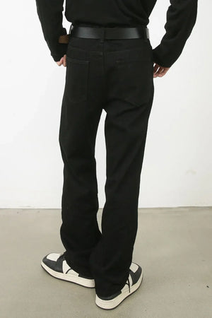 Zipped hem black denim trousers with a relaxed fit.