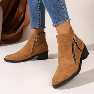 Caramel suede ankle boots with pointed toe and side zipper detail.