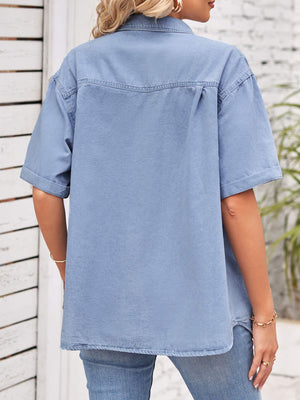 Relaxed light denim shirt jacket with cuffed short sleeves and back yoke detail.