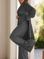 Dark gray draped overlay palazzo co-ord set with wide-leg pants and long sleeves.