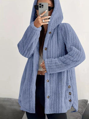 Blue button-up fleece jacket with hood and textured fabric.