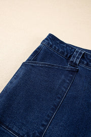 Mid-rise straight leg jeans in dark wash denim with button closure and pocket detail.