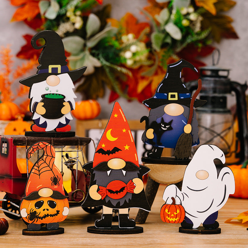 Halloween gnome figurines in assorted styles: witch, pumpkin, vampire, and ghost.