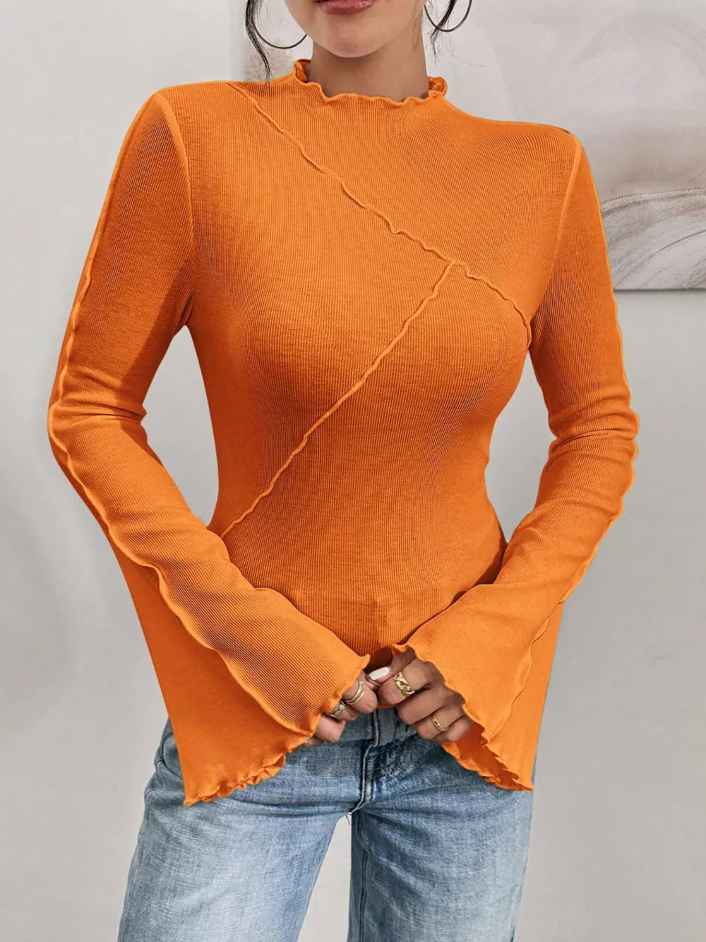 Orange lettuce edge flare sleeve t-shirt with seam detail
