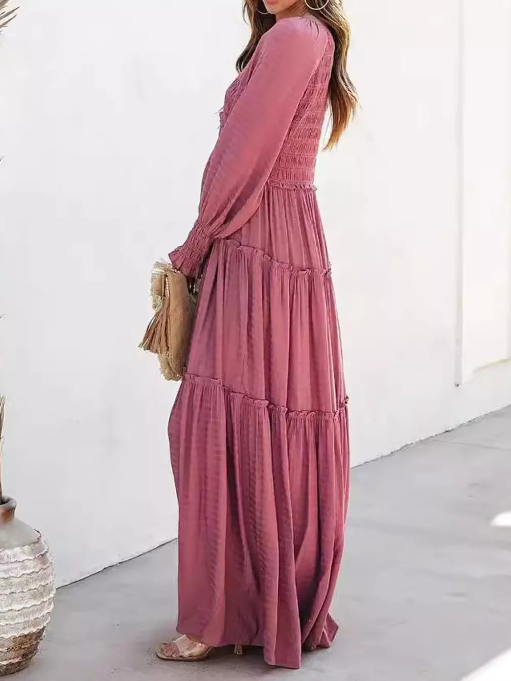 Smocked V-neck tiered maxi dress in Dark Pink with long sleeves and ruffled tiers.