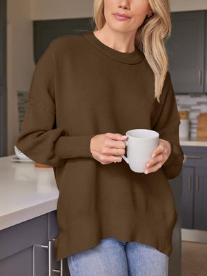 Ribbed-knit relaxed fit sweater in dark brown with crew neck and long sleeves.