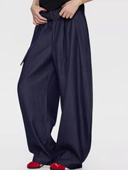 Men's blue wide-leg dress pants with a belted waist and pleats.