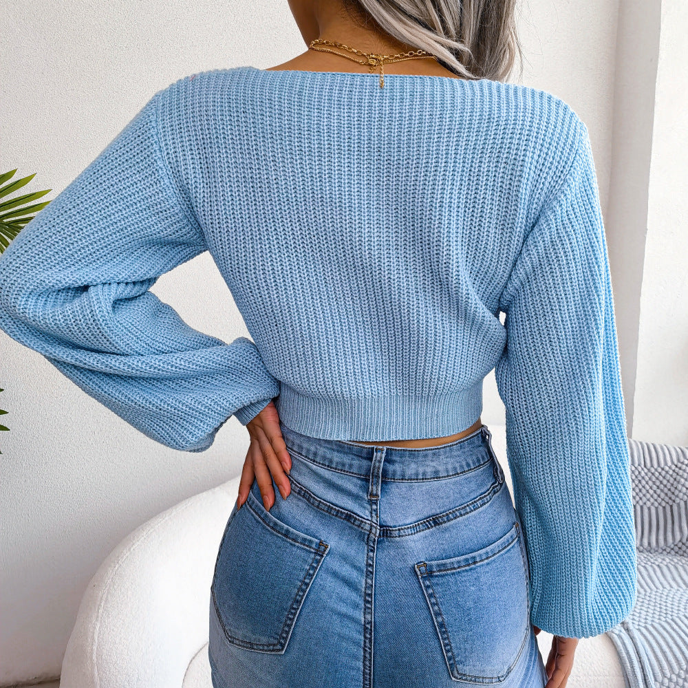 Sky blue ribbed knit crop top with balloon sleeves, casual chic style.