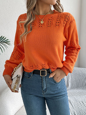 Pumpkin openwork knit sweater with crew neck and long sleeves, featuring intricate eyelet details on the yoke and cuffs.