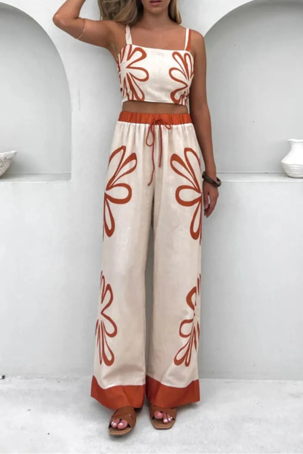Floral print linen co-ord set with crop top and wide leg pants in ochre.