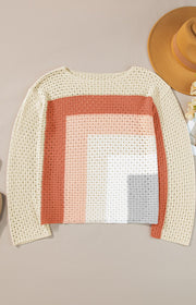 Ombre crochet panel sweater in beige with coral, pink, white, and gray stripes.