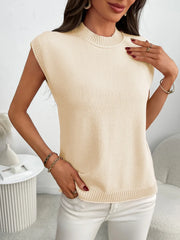 Cream ribbed knit sleeveless mock neck top with a relaxed fit.