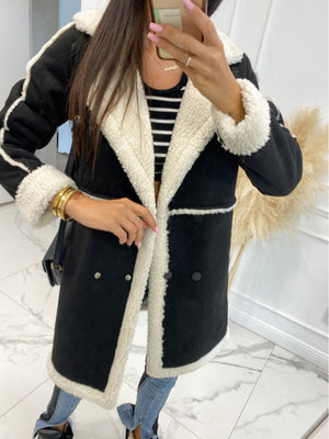 Black suede effect overcoat with shearling trim and collar, double-breasted front.