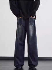 Distressed dark wash wide leg men's jeans with a relaxed fit.