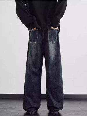 Distressed dark wash wide leg men's jeans with a relaxed fit.