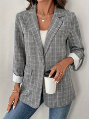 Checked cuff plaid blazer in light gray with buttoned front and rolled sleeves.
