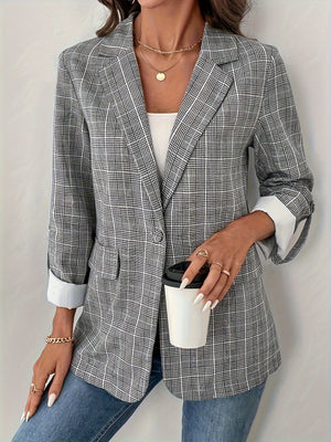 Checked cuff plaid blazer in light gray with buttoned front and rolled sleeves.
