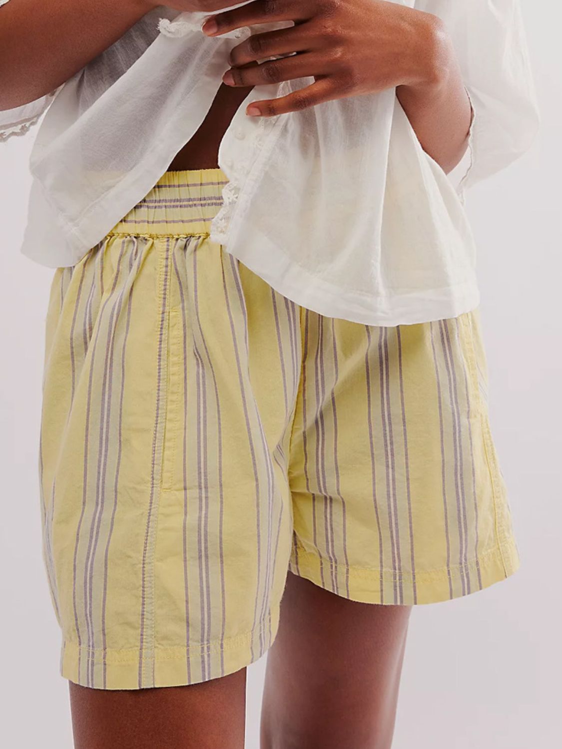 Pastel Yellow stripe shorts with elastic waistband and relaxed fit