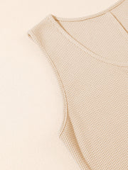 Camel waffle knit button-down romper detail with V-neck and cap sleeves.