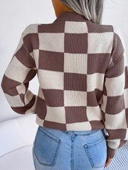Checkerboard knit mock neck pullover in camel and cream acrylic with long sleeves.