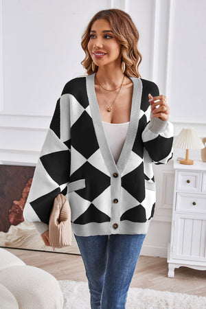 Diamond knit balloon sleeve cardigan in black and white with pockets and V-neck