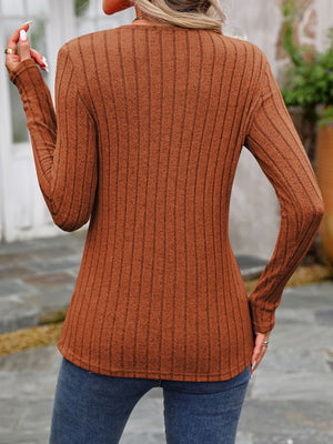 Caramel ribbed knit top with button detail and round neck.