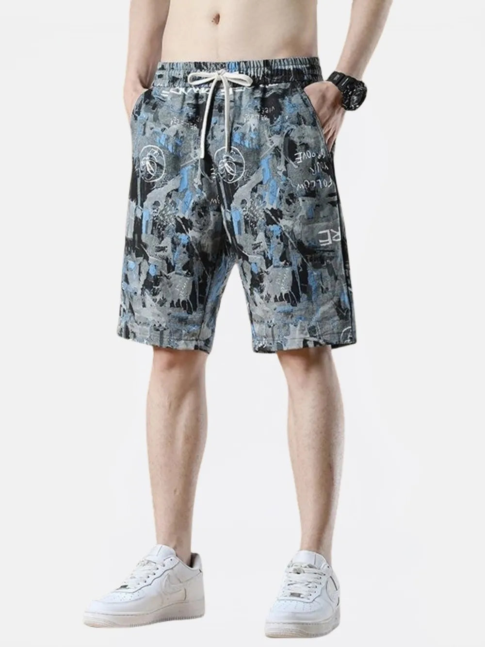 Casual cotton-blend chino shorts in dark gray with a graffiti-style print and drawstring waist.