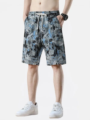 Casual cotton-blend chino shorts in dark gray with a graffiti-style print and drawstring waist.