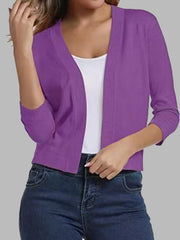 Cropped elbow-sleeve open-front knit cardigan in Dusty Purple, styled with a white tank top and jeans.