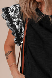 Black tee with embroidered floral flutter sleeves and striped trim.