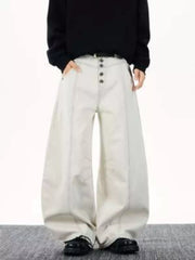 Relaxed fit wide leg button-fly jeans in off-white cotton with front seams.