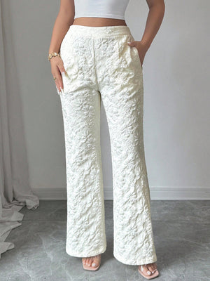 Textured high-waist wide-leg maternity pants with pockets in cream.