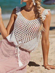 White crochet tank top with tie waist and tassel detail, ruffled straps