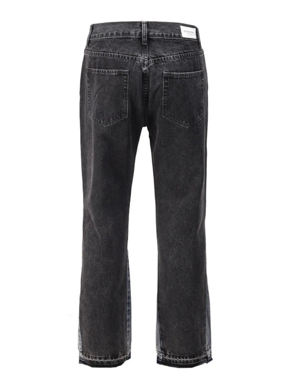 Dark two-tone denim bootcut jeans with raw hem detail