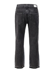 Dark two-tone denim bootcut jeans with raw hem detail