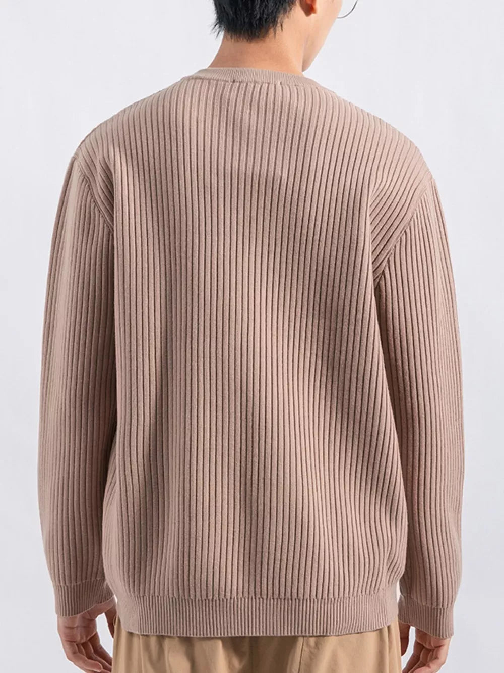Men's apricot ribbed knit sweatshirt with crew neck and long sleeves.