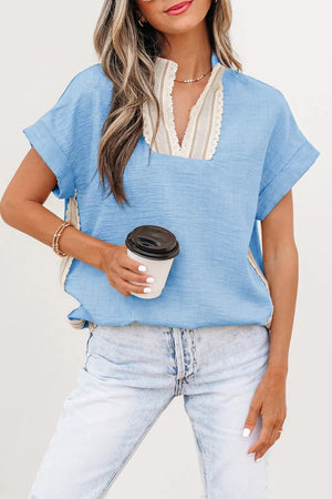 Blue polyester V-neck pullover maternity top with lace trim and striped inset detail