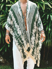 Army green geometric print kimono with fringe trim and wide sleeves.