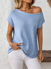 Light blue off-the-shoulder knit tee with short sleeves and a boat neckline.