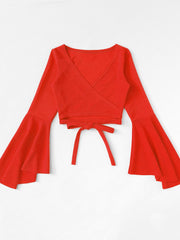 Red wrap crop top with bell sleeves and tie waist