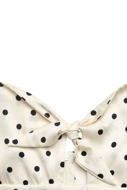 Cream polka dot maxi dress with tie front and cutout detail