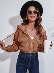 Cropped caramel corduroy hooded jacket with zip front and chest pockets.
