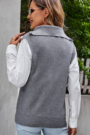 Dark Gray ribbed knit vest with collar and zip neck, layered over a white shirt.