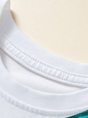 White cotton toddler t-shirt neckline detail with double stitching.