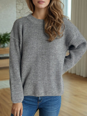 Textured ribbed knit oversized sweater in gray with crewneck and long sleeves.