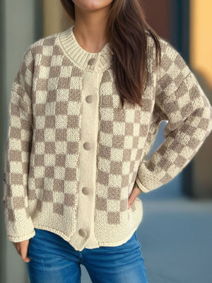 Checkerboard knit button-up cardigan in taupe and cream acrylic with button details.