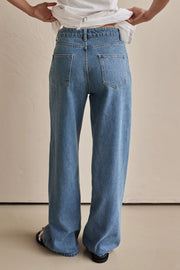 Panelled wide-leg denim trousers in light wash denim with contrast stitching and two back pockets.
